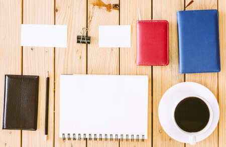 Business stationary set in workspace on wooden background