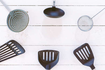 Kitchen utensil on wooden table