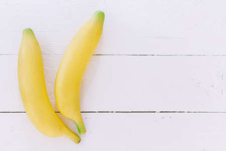 Banana  on wooden backgroundの写真素材