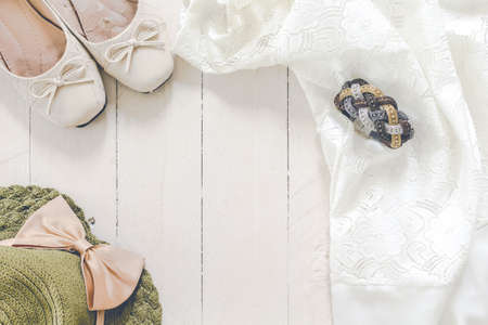 Outfit of casual and woman fashion on wooden background
