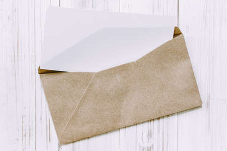 A envelope on wooden backgroundの写真素材
