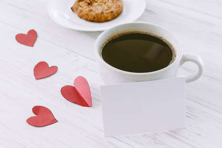 Heart and coffee on a wooden backgroundの写真素材