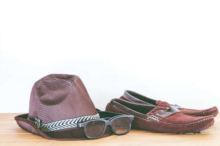Men's casual outfits with accessories on  wooden table