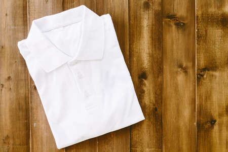 White shirt on the wooden tableの写真素材
