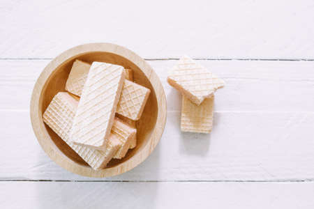 Wafer biscuits on wooden table
