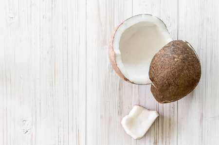 Coconut on wooden background