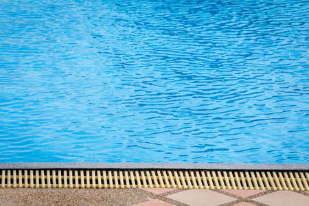 Swimming pool with blue water detailの写真素材