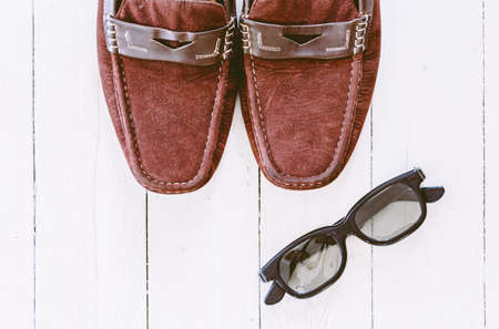 Men's casual outfits with accessories on  wooden backgroundの写真素材