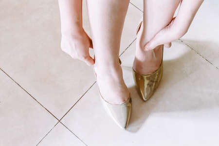 Woman trying on new shoesの写真素材