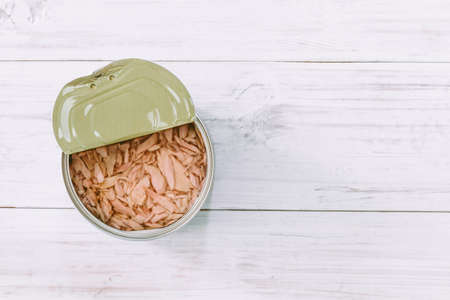Canned tuna on wooden tableの写真素材