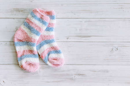 Colorful socks on wooden backgroundの写真素材