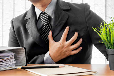 Businessman heart attack  in his office