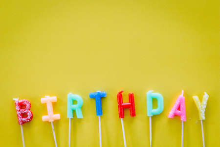 Colored Candles with Text Happy Birthday