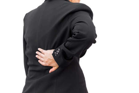 Businesswoman having back painの写真素材