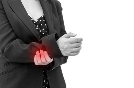 Business woman suffering from wrist painの写真素材