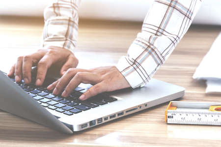 Engineer working with laptopの写真素材