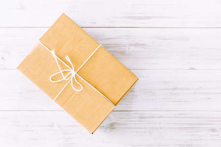 Packaged boxes delivery on wooden backgroundの写真素材