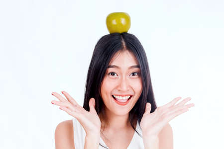 Beautiful woman with appleの写真素材