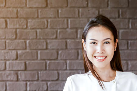 Young smiling asian womanの写真素材