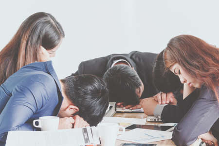 Group of business people sleeping at the meetingの写真素材