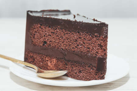 Chocolate cake on wooden tableの写真素材