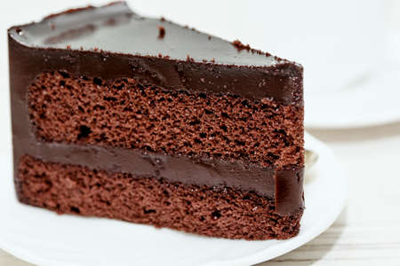 Chocolate cake on wooden tableの写真素材