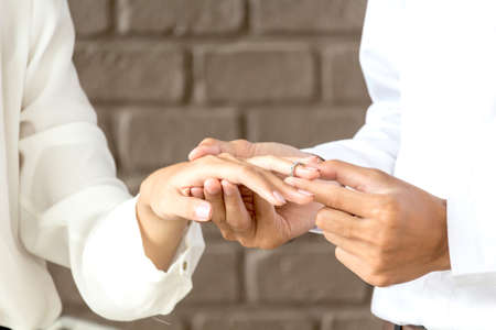 Man giving a ring for gift to a femaleの写真素材