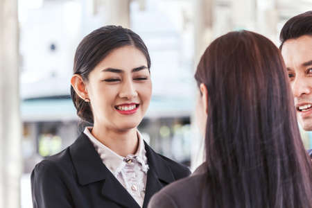 Group of business partners talking and working の写真素材