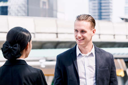 Image two business partners talking and working togetherの写真素材