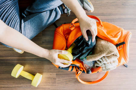 Man with bag and fitness equipmentの写真素材