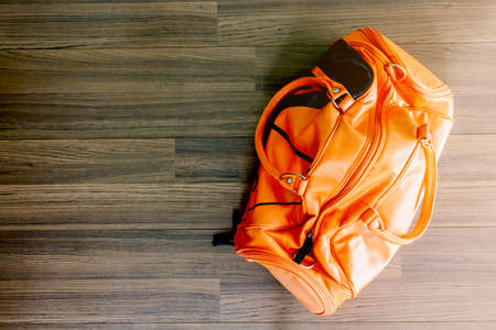 Sports bag on wooden backgroundの写真素材