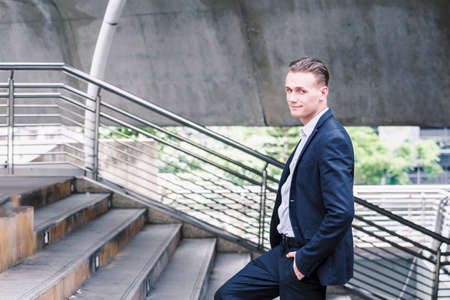 Businessman walking up the stairs