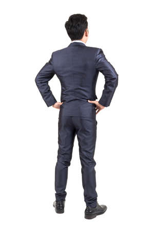 Businessman in black suit standing isolated on white backgroundのeditorial素材