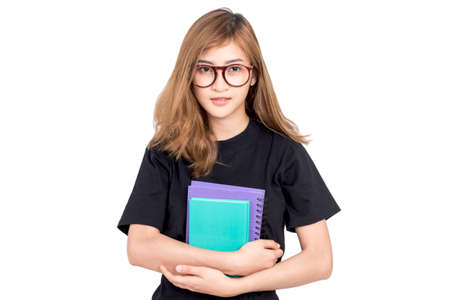 Portrait of female student holding book isolated on white background