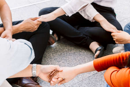 Group of team work people holding hands together.friendship conceptの写真素材