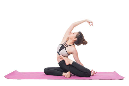 Woman practicing yoga isolated on white background