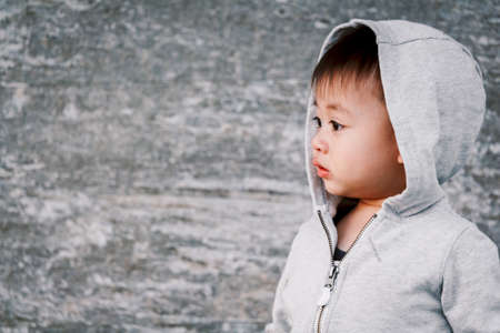 Portrait of Little baby boy in a jacketの写真素材