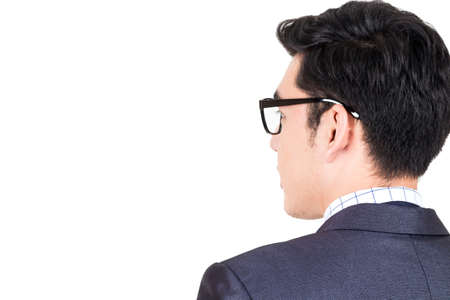 Businessman in black suit standing isolated on white backgroundの写真素材