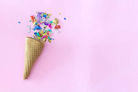 Waffle cone ice cream on pink background