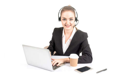 Beautiful businesswoman customer support services working with headset and laptop computer isolated...