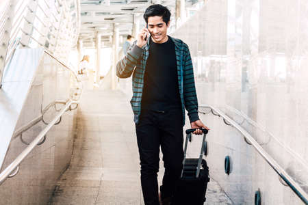 Business people walking with luggage