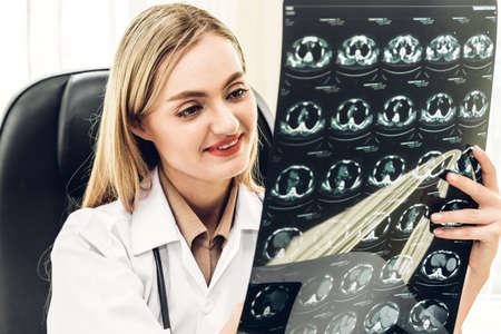 Female doctor looking at x-ray photo in hospital.healthcare and medicine