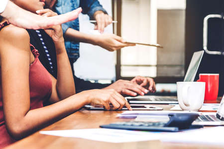Group of casual business discussing and working with laptop computer.creative business people...