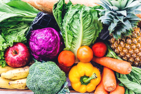 Different fresh fruits and vegetables background.Healthy eating