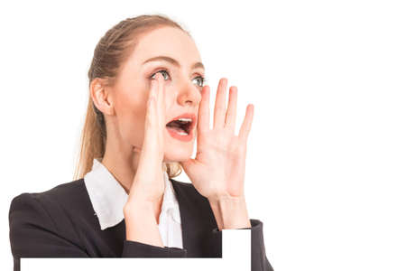 Woman whispering gossip isolated on white backgroundの写真素材