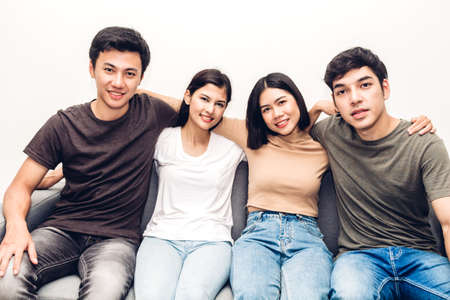Group of happy friend sitting relax on sofaの写真素材