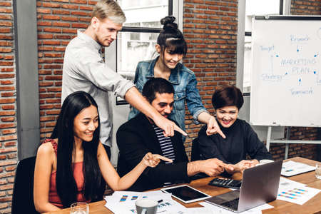 Group of casual business discussing and working with laptop computer.creative business people...