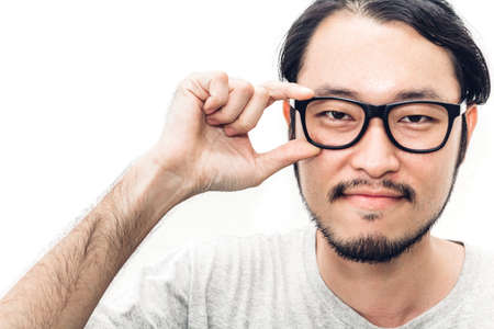 Portrait of happy smiling asian young handsome man on white background