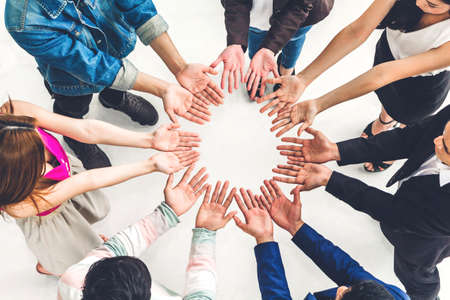Top view of successful of group business people showing their hands with open palms together at office.Friendship teamwork conceptの写真素材
