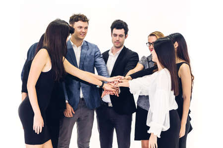 Successful of group business people stack and putting their hands together at office.Friendship...